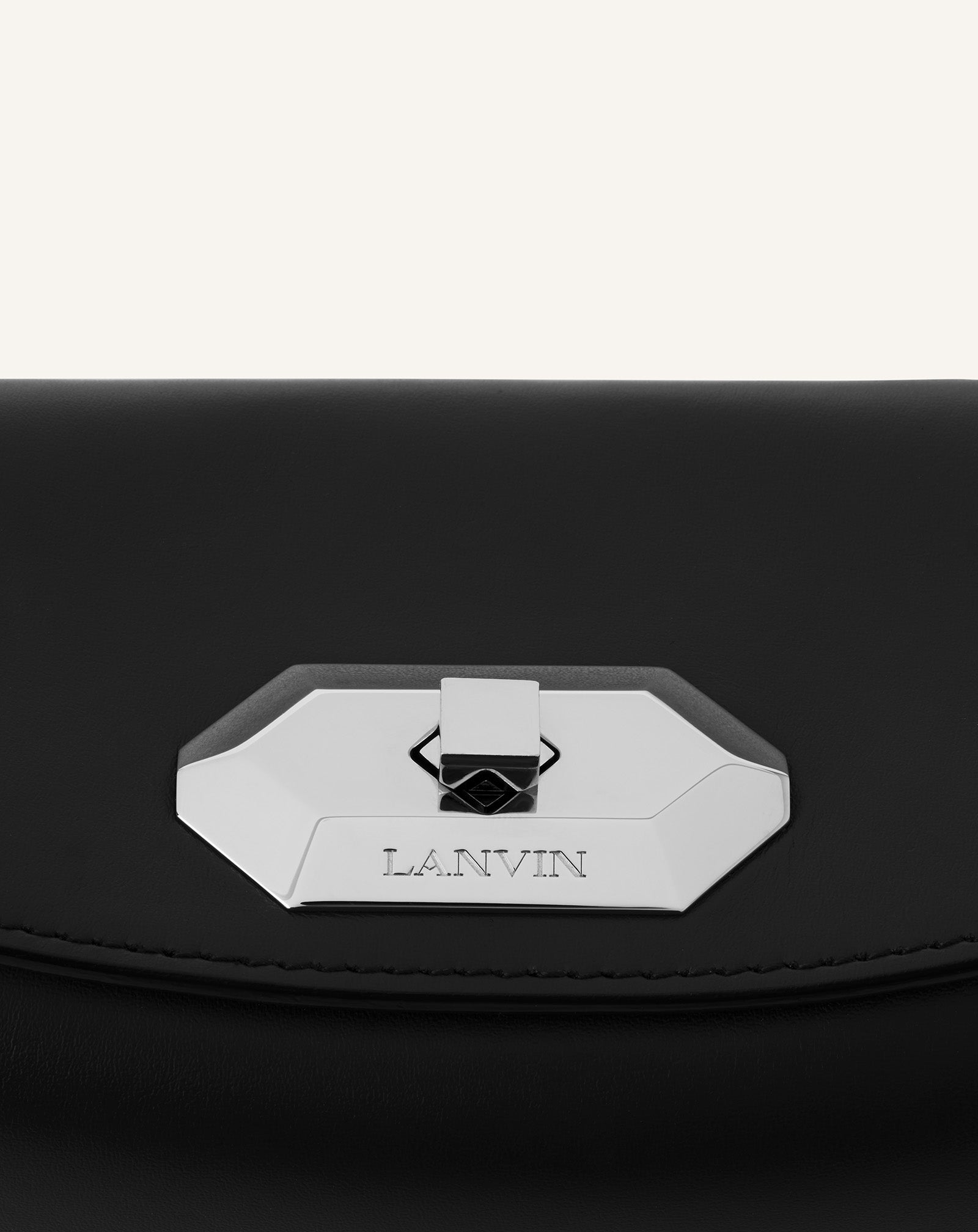 COMPAGNON ASYMMETRICAL LEATHER CLUTCH BAG