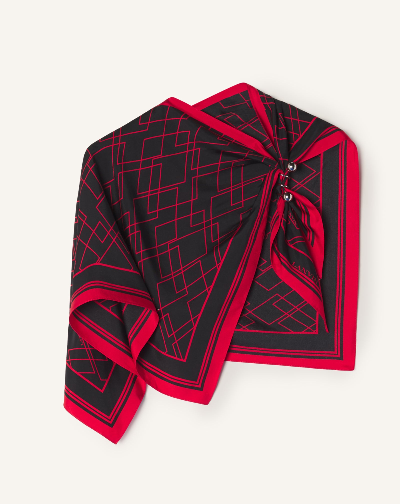 BLACK GRAPHIC DIAMOND MOTIF TOP WITH JEWELRY FASTENER