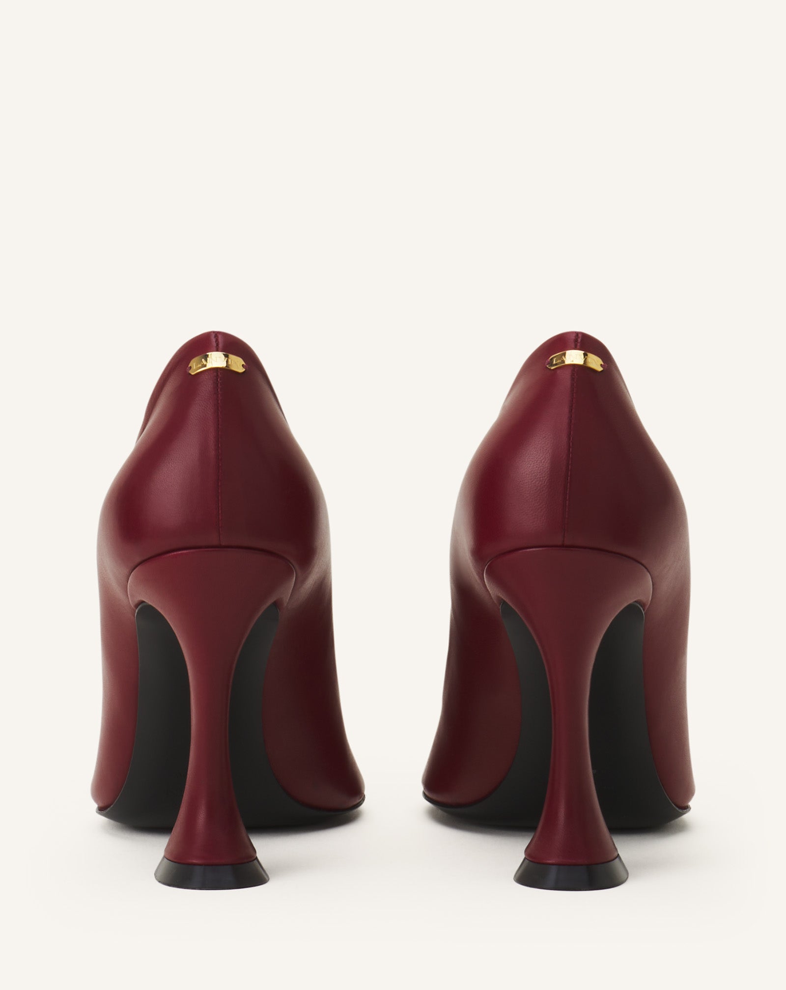 MIDNIGHT STEP LEATHER BOW PUMP