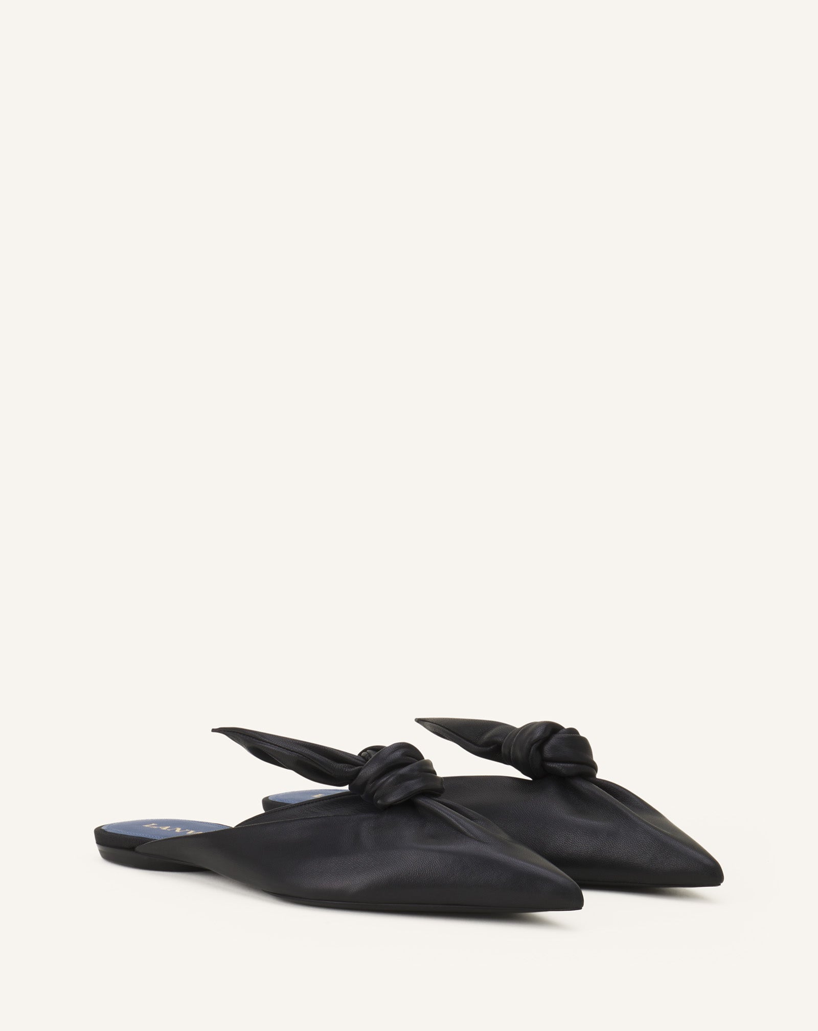MIDNIGHT STEP MULES WITH A LEATHER BOW