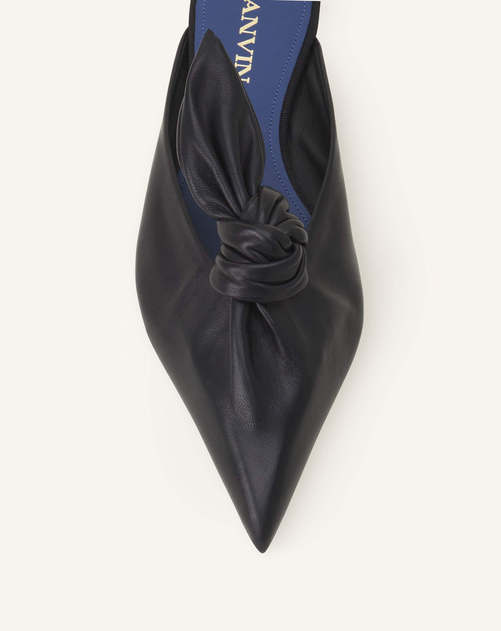 BLACK MIDNIGHT STEP MULES WITH A LEATHER BOW